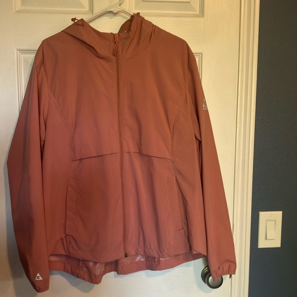 Women's XXL pink wind breaker. Never worn.